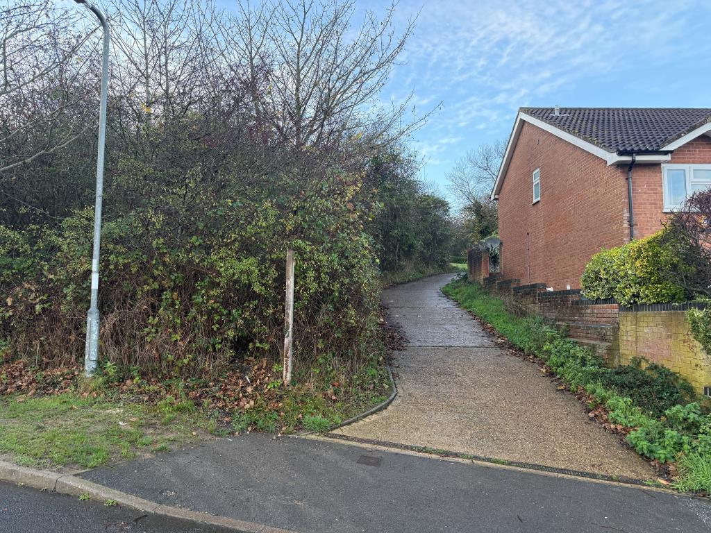 Lot: 63 - PARCEL OF LAND WITH POTENTIAL - Corner view of land with side access